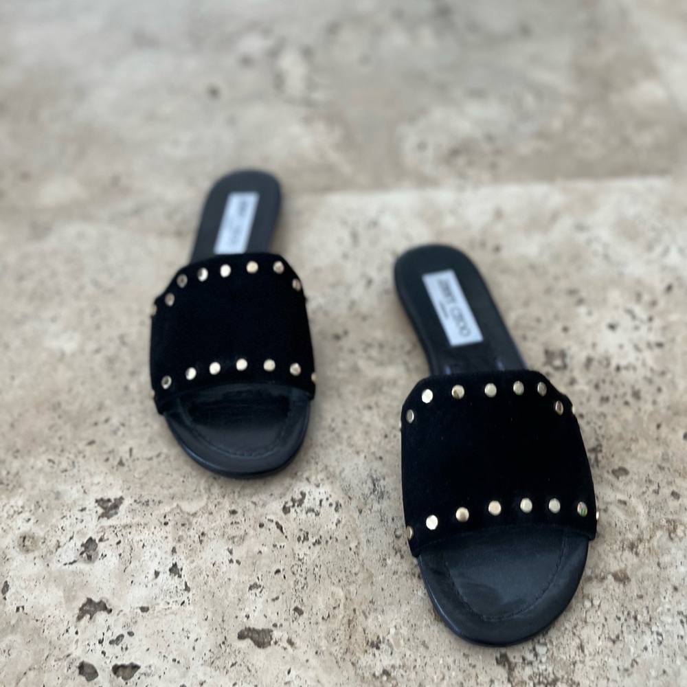 Only worn once. Jimmy Choo sandal black suede with gold size 7.5